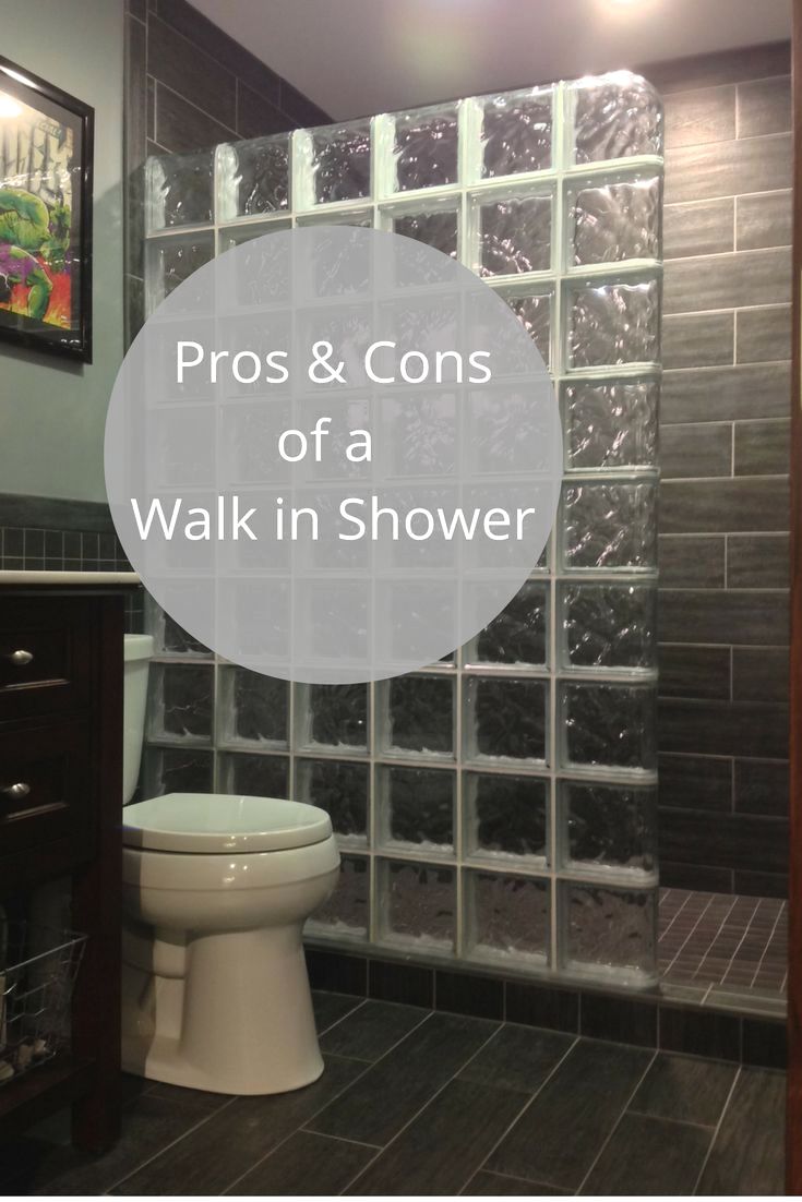 a walk in shower sitting next to a toilet under a painting with words pros and cons of a walk in shower