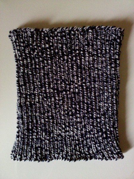 a piece of black and white woven material