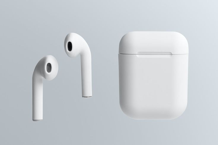 an apple airpods and headphones are shown in this image, one is white