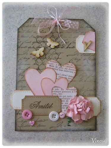 a close up of a card with buttons and flowers