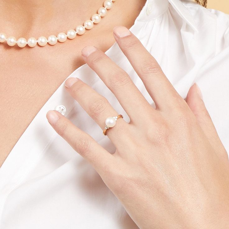 This beautiful pearl ring features a lustrous AA+ quality 7.5-8.0mm white Akoya pearl, imported directly from the pearl farms of Japan. The pearl is mounted with dazzling SI clarity diamonds on a 14K gold band.
This ring is available in a number of sizes for the perfect fit. Akoya Pearl Ring, Pearl Farm, Pearl Rings, Akoya Pearls, Pearl Diamond, The Pearl, Gold Band, Pearl Ring, Gold Bands