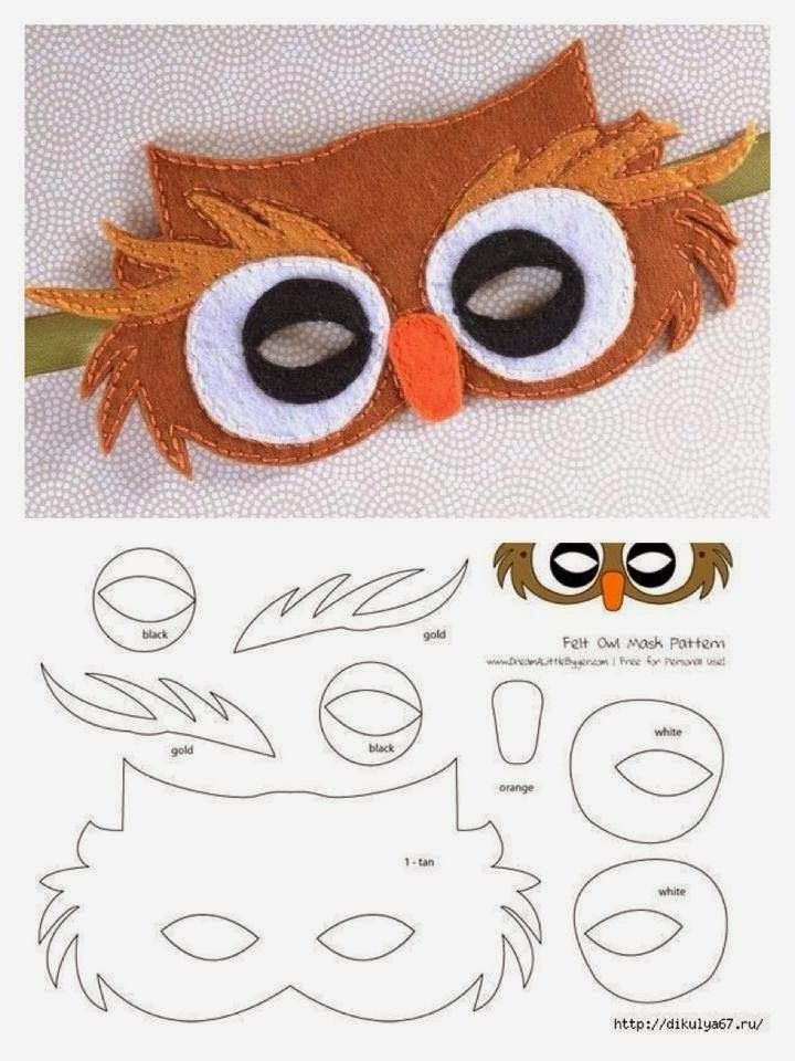 an owl mask made out of felt and paper