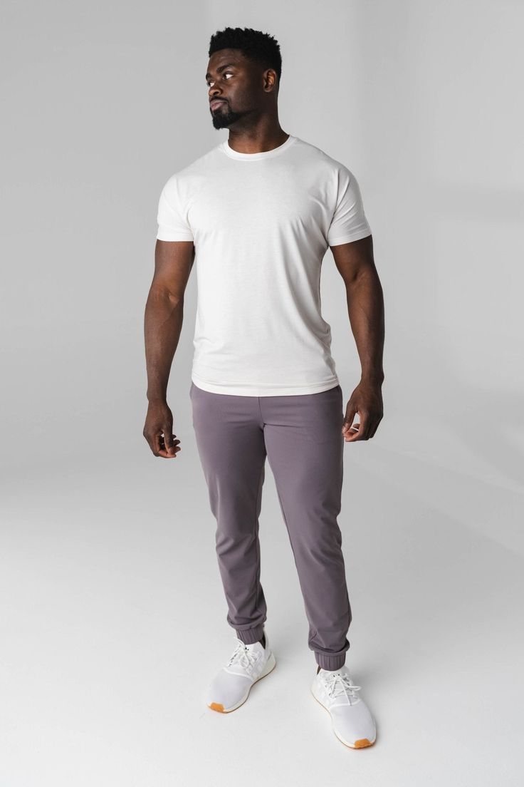 Our Navigator Jogger is designed to perform outdoors and on the go. This versatile jogger is a relaxed fit which offers functionality and comfort while also providing a sporty look to add to your wardrobe. Casual Breathable Activewear With 4-way Stretch, Casual Gray Breathable Activewear, Casual Stretch Activewear Sweat Resistant, Casual Activewear For Gym With 4-way Stretch, Versatile Moisture-wicking Activewear For Jogging, Casual Solid Activewear With Light Support, Versatile Go-dry Joggers For Workout, Gray Casual Activewear Sweat Resistant, Casual Gray Sweat-resistant Activewear