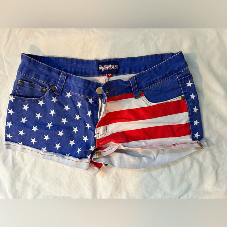 Perfect For Fourrh Of July! American Flag Jean Shorts, Very Stretchy!! Never Worn, Just The Wrong Size. Casual American Flag Bottoms For 4th Of July, Blue Jean Shorts With American Flag Print, Casual American Flag Cotton Bottoms, Casual Cotton Bottoms With American Flag, Patriotic Blue Cotton Shorts, Blue Cotton Shorts With American Flag Print, Blue Bottoms With American Flag Print, Patriotic Blue Shorts For Spring, Trendy American Flag Print Cotton Shorts