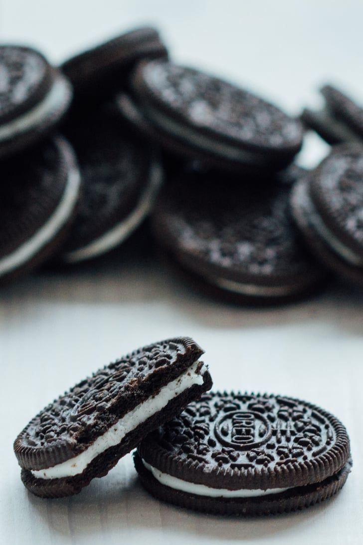 two oreo cookies sitting next to each other