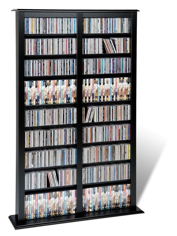 a large black bookcase filled with lots of dvd's