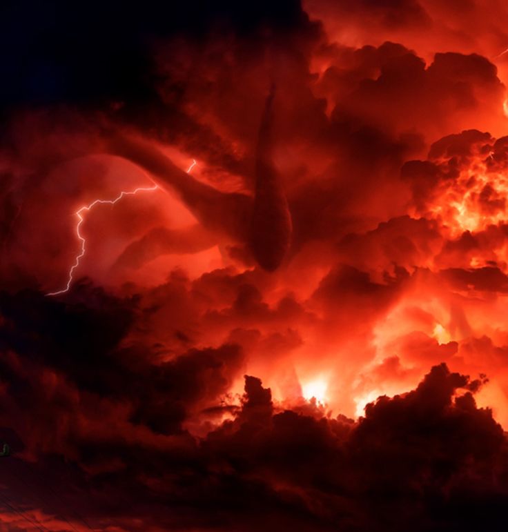 the sky is filled with red clouds and lightning