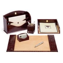 a desk set with pen, notepad, and inkwell in black leather case