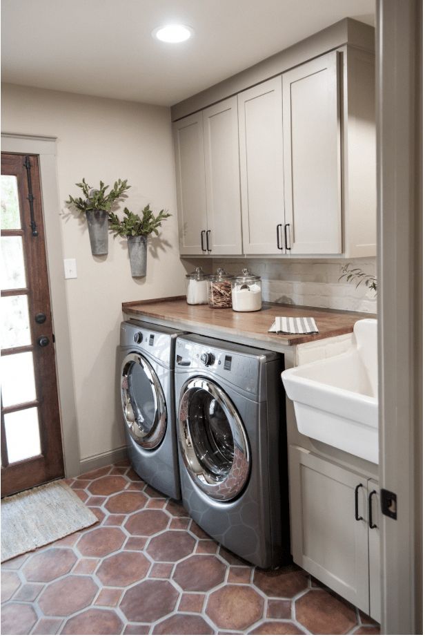 a washer and dryer in a small room