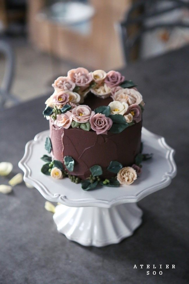 there is a chocolate cake with flowers on it