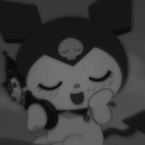 a black and white photo of a cartoon character