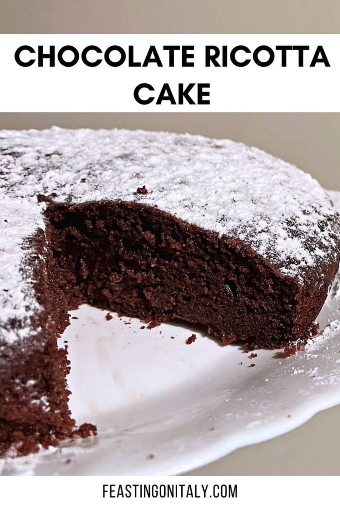 This is a pin image with a sliced Chocolate Ricotta Cake. The text reads "Chocolate Ricotta Cake." Chocolate Ricotta Cake Italian Desserts, Cake Recipes Using Ricotta Cheese, Italian Chocolate Ricotta Cake, Chocolate Chip Ricotta Cake, Ricotta Chocolate Cake, Pumpkin Ricotta Cake, Planet Chocolate, Chocolate Ricotta Cake, Ricotta Cupcakes