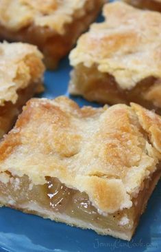 several pieces of pie on a blue plate