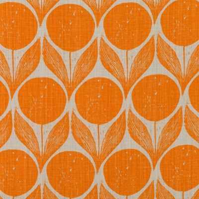 an orange wallpaper with circles and leaves