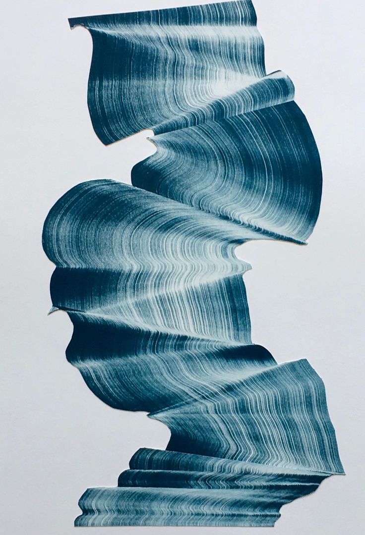 an abstract piece of art that looks like waves