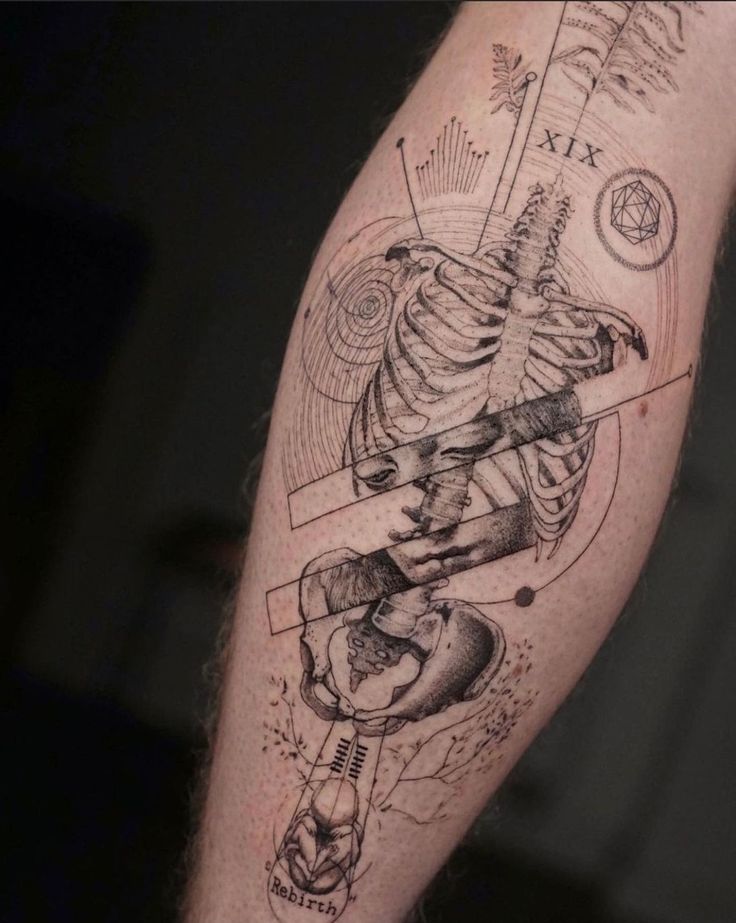 a man's arm with a skeleton holding a guitar and some other things on it