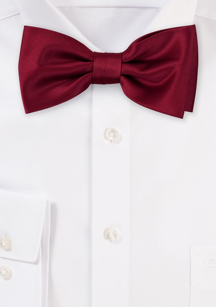 Add a touch of timeless elegance with the Burgundy Solid Bowtie. This classic accessory is the perfect choice for formal occasions and special events. The deep and rich burgundy color of the bowtie exudes sophistication and refinement, making a bold statement with every wear. Whether you're shopping for mens suits or attending a black-tie affair, this versatile bowtie effortlessly elevates your style. Its solid design and luxurious fabric make it a must-have addition to your wardrobe. Let the Bu Luxury Classic Red Tie, Black Tie Affair, Burgundy Color, Formal Occasion, Black Tie, Luxury Fabrics, Special Events, Timeless Elegance, Red