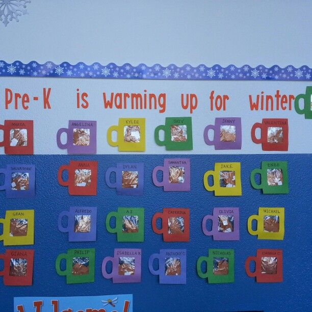 a bulletin board with coffee mugs and snowflakes on the bottom, which reads pre - k is warming up for winter