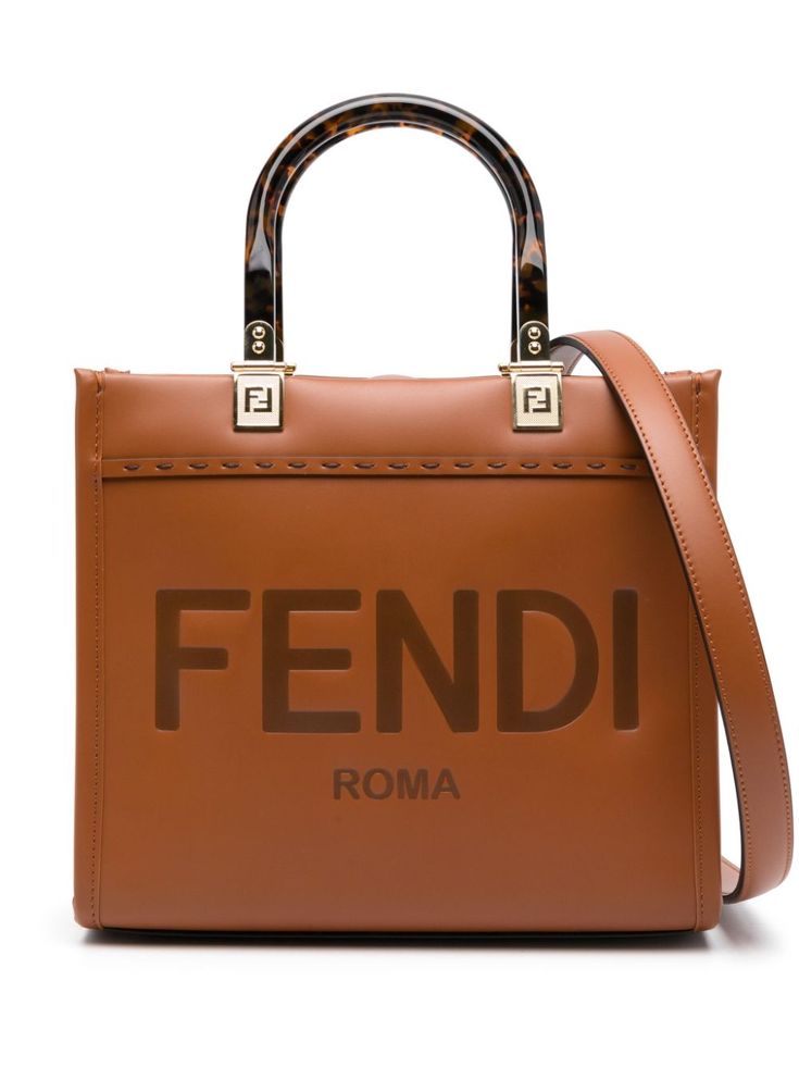 caramel brown calf leather smooth grain debossed logo to the front FF logo plaque concealed top-magnetic fastening adjustable detachable shoulder strap tortoiseshell-effect top handles main compartment internal slip pocket debossed internal logo full lining gold-tone hardware This piece comes complete with a protective dust bag. Fendi By The Way Mini, Fendi Sunshine, Fendi Tote Bag, Fendi By The Way, Fendi Tote, Fendi Mini, Fendi Handbag, Ff Logo, Front Face