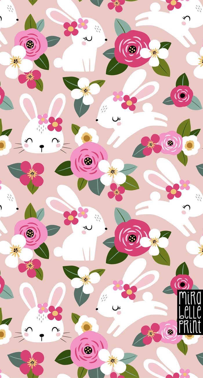 a pink background with white rabbits and flowers