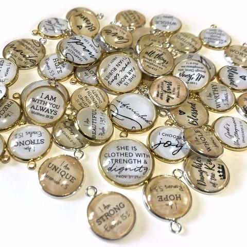 many different types of buttons with writing on them