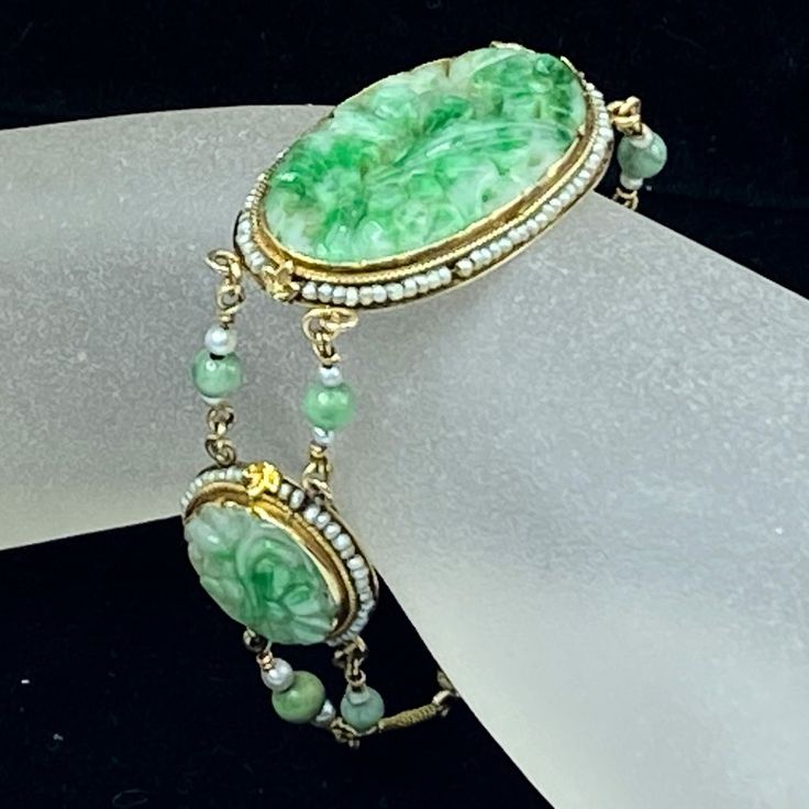 One Art Deco 14k Yellow Gold Jade Bracelet. There Are One Large Oval And Two Round Shaped Jade, Hand Carved Floral Pattern, Embellished With Natural Seed Pearls And Rope Link On The Bezel. The Jade Connet By Two Strands Of Natural Pearl And Jade Bead (5.0mm). The Oval Jade Is 35.0 X 20.0mm, The Round Jade Is 20.0mm Diameter. Total Weight 17.0gm, 7.0" Long, Hallmark 14k (1 Inch = 25.4 Mm; 1 Dime = 17.9mm). All Items Are Pre-Owned Unless Otherwise Stated. This Means They Have The Usual Aspects Of Pre-Owned Jewelry, Such As Light Scratches, Wear And Tarnish. Please Review All The Photos Which Will Be Part Of The Description. Collectible Yellow Gold Jade Jewelry, Formal Green Hand-strung Jewelry, Vintage Jade Jewelry Hand-strung, Elegant Jade Jewelry For Collectors, Elegant Collectible Jade Jewelry, Vintage Hand-strung Jade Jewelry, Jade Bead Bracelet, Jewelry Diy Ideas, Jade Bracelet