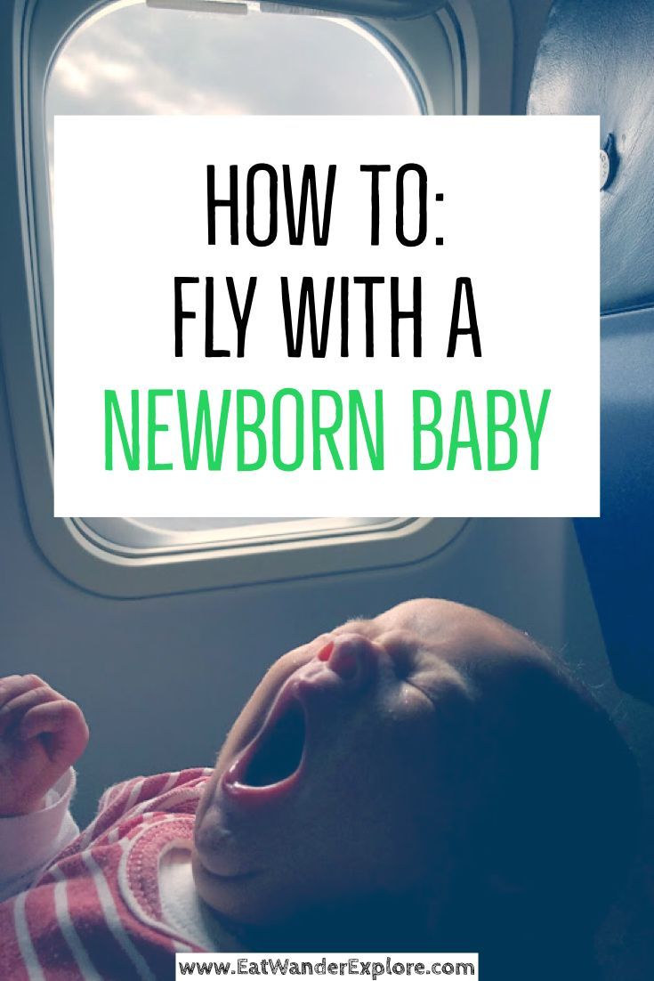 a baby yawning with the words how to fly with a newborn baby