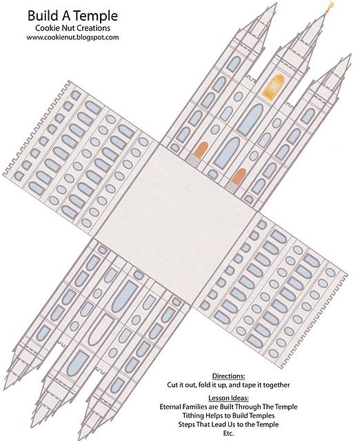 a paper model of a building with two towers and three spires on each side