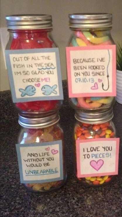 three jars filled with different types of candy