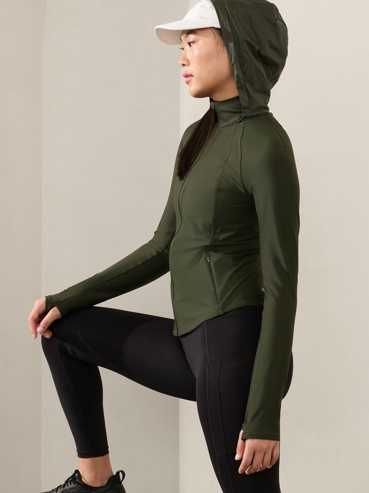 FOR: Medium to high-impact workouts at the gym, studio, or outdoors FEEL: PowerMove fabric is engineered with interlock construction using 50-gauge knitting technology, offering sleek, compressive support and a no-slip fit FAVE: Removable hood Thumbholes hold sleeves in place and keep warmth in Secure zip pockets to store your essentials Fitted next to the body High hip length, hem hits at upper hips Body length in size medium: Regular: 24" Petite: Front 24" Back 22" Tall: 25". Sports Wear Women, High Hips, Bra Dress, Big And Tall, Sport Wear, Swim Accessories, Hip Length, Petite Size, Sport Fashion