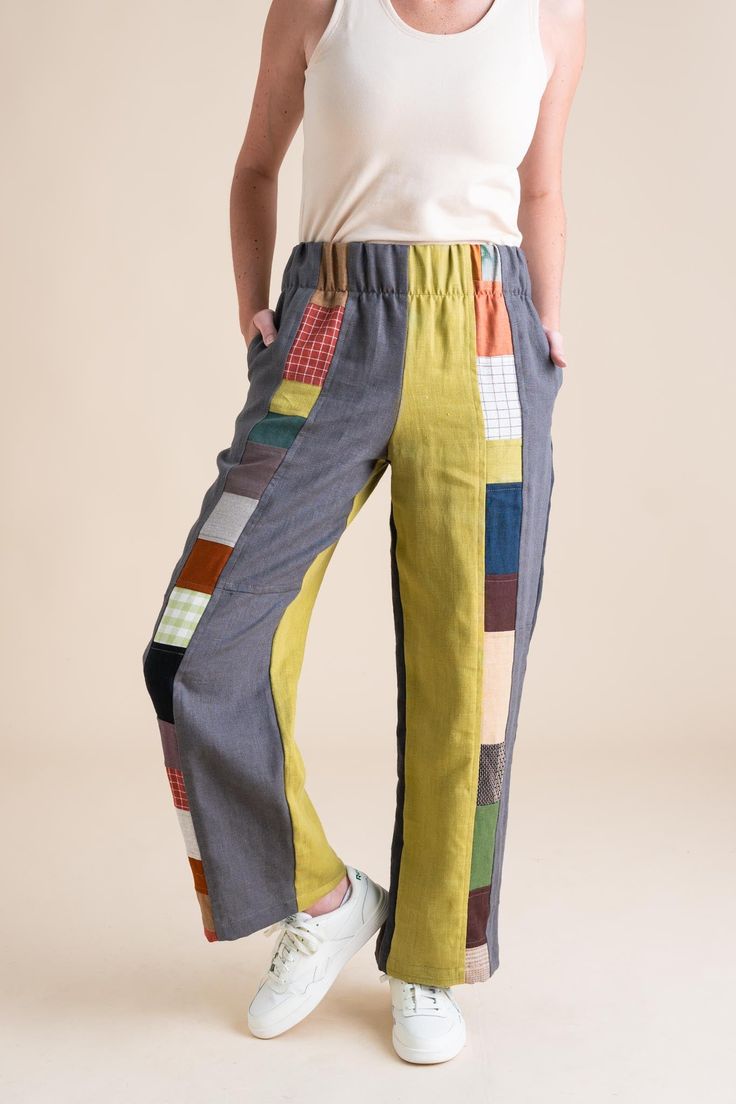 Stand out in our Patchwork Sunset Pants—a one-of-a-kind masterpiece crafted from a collection of cotton and linen fabric scraps we've carefully saved throughout the year. These unique pants are perfect for transitioning effortlessly between summer and fall, and back again. Features: One-of-a-Kind Design: Each pair is a unique patchwork of carefully selected fabric scraps. Versatile Styling: Ideal for shifting seasons, blending summer ease with autumn warmth. Pull-On Comfort: Easy to wear with a Between Summer And Fall, Jumpsuit And Cardigan, Unique Pants, Skirt Leggings, Cotton Fleece, Cardigan Tops, Cardigan Jacket, Sewing Inspiration, Fabric Scraps