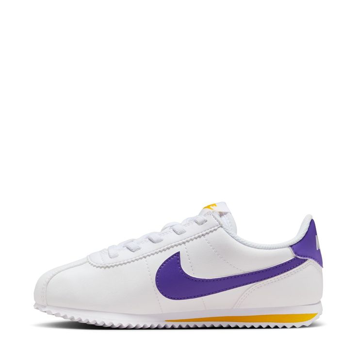 The Nike Cortez EasyOn Kid's Sneakers are easy like Sunday morning! They're simple to get on and will remain comfortable throughout the entire day. With their low profile, your child's feet and ankles can move just how nature intended, as much as possible.Features: Features Nike Swoosh on side. Padded tongue and collar. Padded insole. Can slip on easily. Details: Lace-up and hook-and-loop. Low-top. Soccer Shop, Black And White Sneakers, Wide Width Shoes, Backpack Sport, Nike Swoosh, Kids Sale, Soccer Cleats, Nike Cortez, Dress Sandals