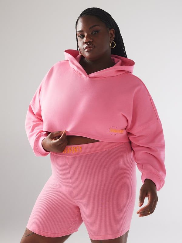 Never miss a beat in our Xssential Terry Cropped Hoodie, featuring a dropped shoulder, raw edge details, and a Savage X Fenty graphic on the front hem. Oversized Hoodie Activewear With Ribbed Cuffs, Spring Athleisure Hooded Hoodie, Spring Athleisure Hoodie, Athleisure Hoodie For Spring Loungewear, Spring Athleisure Hoodie For Loungewear, Sportswear Hoodie With Drawstring For Spring, Spring Sportswear Hoodie With Drawstring Hood, Spring Sportswear Hoodie With Ribbed Cuffs, Hooded Sweats For Spring Streetwear