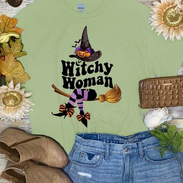 Spooky Halloween fun awaits you with this Witchy Woman Graphic Shirt! This Witchy Woman shirt is perfect for any Halloween activity. From trunk or treat events, to festivals, to just hanging out watching scary movies, this will be your go to shirt this Halloween season! Shop Born To Be Sassy for all of your fun Halloween graphic tees! Halloween Novelty Tops With Funny Text, Halloween Fun T-shirt With Funny Text, Cotton Halloween Costume Party Tops, Halloween Novelty Tops With Letter Print, Novelty Letter Print Tops For Fall, Funny Halloween Shirt With Letter Print, Funny Halloween Letter Print Shirt, Fun Fall T-shirt With Funny Print, Cotton Tops With Letter Print For Costume Party