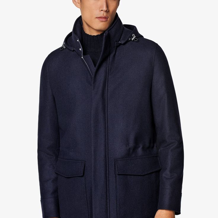 A richly layered
  piece made to keep you warm in luxury, this navy parka
  puts a tailored spin on a classic winter layer and brings adaptable features
  like a removable inner layer and cinching drawstring Navy Outerwear With Detachable Hood For Cold Weather, Luxury Hooded Parka For Fall, Luxury Hooded Fall Parka, Luxury Parka With Detachable Hood For Cold Weather, Navy Winter Outerwear With Detachable Hood, Classic Parka With Detachable Hood For Fall, Classic Parka With Detachable Hood For Cold Weather, Classic Fall Parka With Detachable Hood, Navy Hooded Jacket With Detachable Hood For Winter