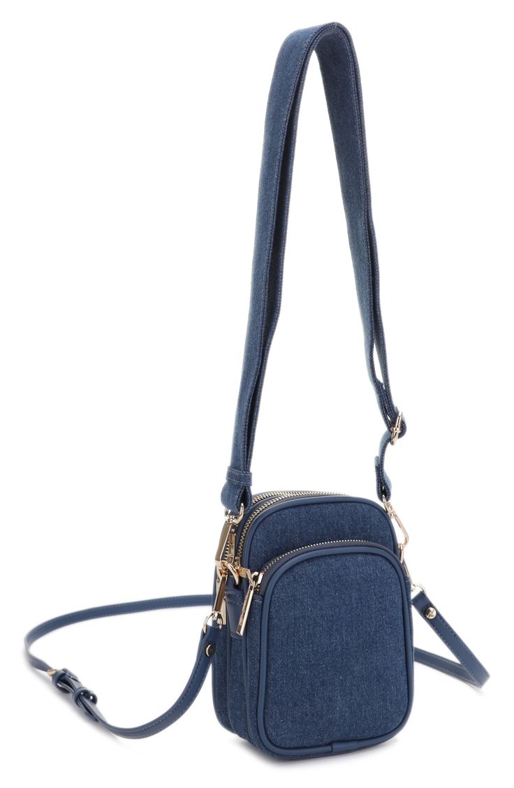 Multiple compartments and carrying straps distinguish a stylish denim crossbody bag perfect for your on-the-go days. Leopard-print lining Cotton with PETA-certified vegan leather trim Imported Asian Owned/Founded Denim Crossbody Shoulder Bag For Travel, Denim Crossbody Travel Bag, Travel Denim Shoulder Bag With Adjustable Strap, Denim Shoulder Bag With Adjustable Strap For Travel, Travel Denim Blue Shoulder Bag With Zipper, Denim Blue Crossbody Shoulder Bag For Travel, Denim Blue Crossbody Shoulder Bag With Removable Pouch, Denim Crossbody Shoulder Bag With Mobile Phone Pocket, Denim Blue Crossbody Shoulder Bag With Adjustable Strap