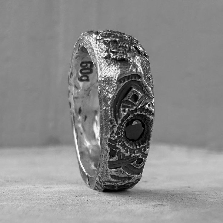 BLACK MANDALA RingMaterial: 925 Sterling SilverProcessing Type: volcanic oxidation+polishingNatural Black Spinel (Diamond cut) 3mm- 1pcs DESCRIPTION:MANDALA is a unique silver ring, handmade using a combination of techniques. The main accent of this model is the image of the Mandala, personifying the model of the universe, the "map of space" imprinted on the stone. I took a cast for it from a small section of the wall of an ancient Buddhist temple in Laos. Also on this ring you will see integrat Black Brutalist Sterling Silver Jewelry, Black Brutalist Jewelry As A Gift, Black Oxidized Promise Ring, Black Etched Sterling Silver Jewelry, Spiritual Black Engraved Sterling Silver Ring, Unique Black Oxidized Finish Ring, Unique Black Ring With Oxidized Finish, Artisan Black Round Ring, Artisan Black Sterling Silver Rings