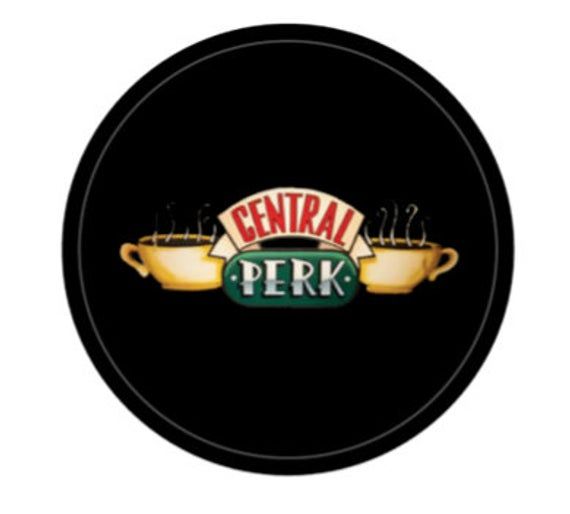 the central perk logo is shown on a black plate with gold trimmings