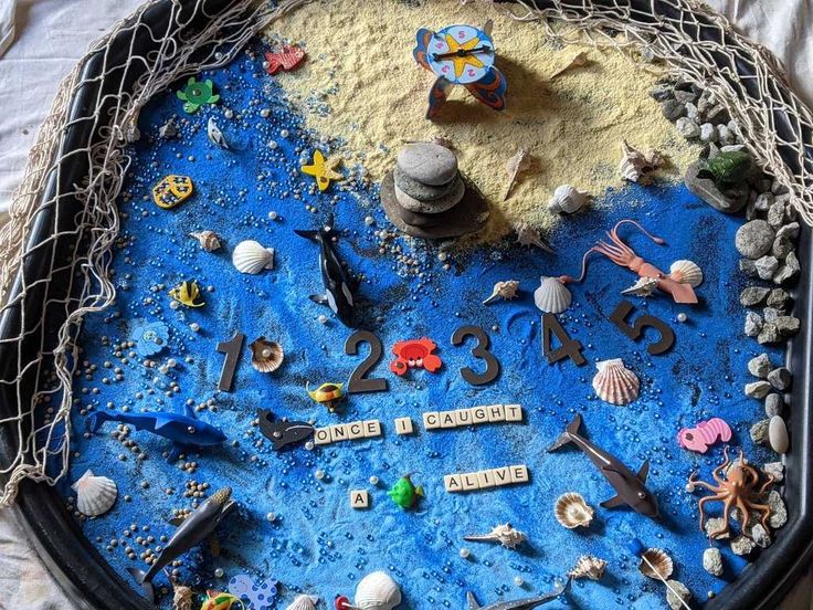 #tuffspot #tufftraysmaths #mathstufftrayeyfs #tuffspotplay #tufftraysideaseyfs Fish Provocation, 12345 Once I Caught A Fish Alive Activities, Under The Sea Tuff Tray Ideas, Once I Caught A Fish Alive Activities, Ocean Themed Tuff Tray, Rainbow Fish Tuff Tray, Maths Help, Play Doh Activities, Edible Sand