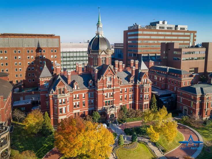 an aerial view of the campus and surrounding buildings