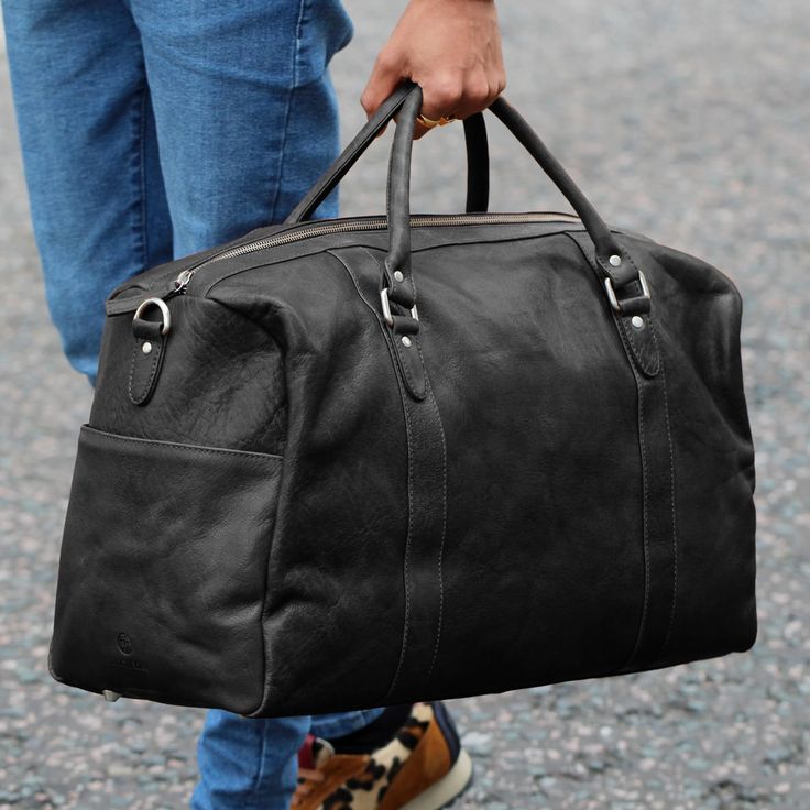 *  Detachable shoulder strap    *  Genuine raw leather    *  Plenty of space for the gym, or a weekend trip    *  YKK zippers   > Raw Leather, Leather Duffle Bag, Leather Duffle, Weekend Trip, Short Trip, Pierre Cardin, Overnight Bag, Duffel Bag, The Gym