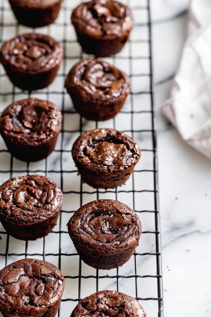 chocolate cupcakes cooling on a wire rack