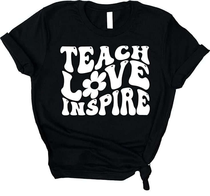 a black t - shirt with the words teach love inspire written in white on it