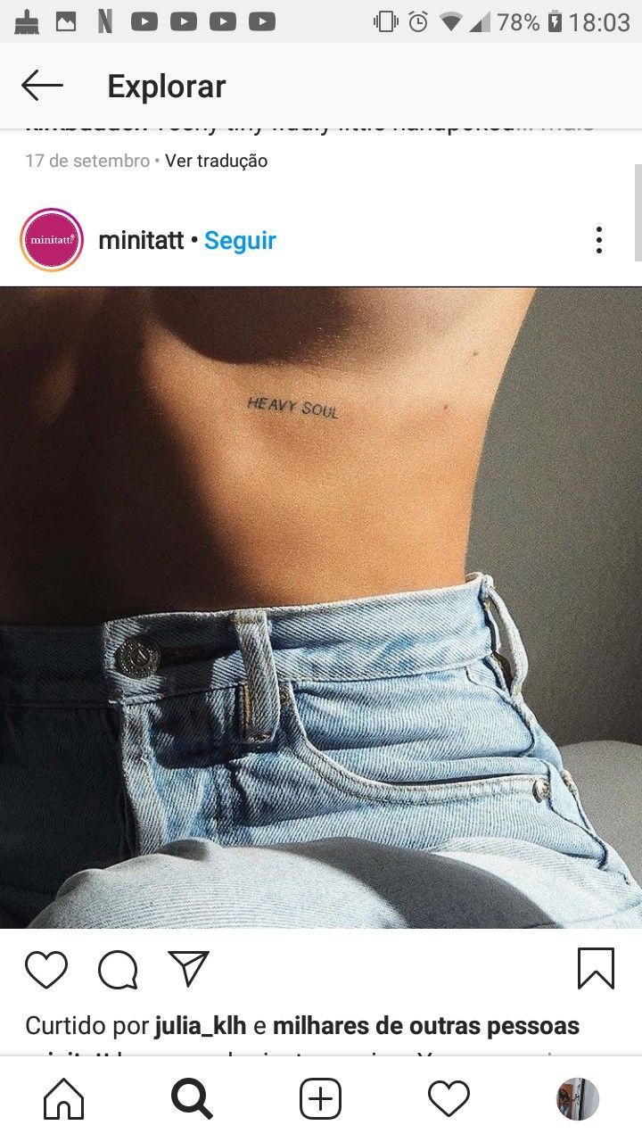 the back of a woman's stomach with an inscription on it