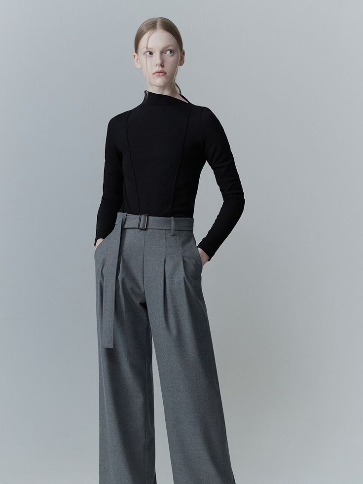 Editor's Notes This trouser from RE RHEE combines the element of a smart tailoring and a practical design that features a detachable waist belt and pintuck detail front in a semi-high rise. Its silky finish and wide leg silhouette make your legs elongated with a wrinkle resistant fabric. It is an easy piece to dress up or down. - Trouser with a detachable waist belt - Warm and flowy finish, wide leg fit in a full length, and a semi-high rise- Two pintuck detail at the front and si Elegant Gray Wide Leg Workwear Pants, Elegant Gray Wide Leg Pants For Work, Gray Wide Leg Pants With Belt Loops For Work, Belted Fitted Wide Leg Pants For Work, Fitted Belted Wide Leg Pants For Work, Elegant Wide Leg Pants With Belted Cuffs For Work, Gray Fitted Wide Leg Pants For Business Casual, Chic Fitted Gray Wide Leg Pants, Chic Gray Wide Leg Pants For Work