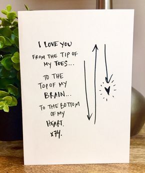 a card with an arrow drawn on it and the words i love you from the tip of my toes to the top of my brain