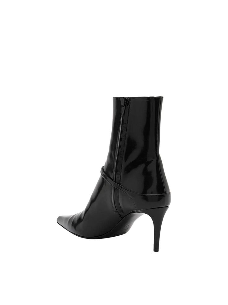 The Vendome Buckle by Saint Laurent boots have a patent leather finish and are crafted with a leather sole, footbed and lining. They have a side zipper closure and a pointed toe design. The boots feature a 2.75" stiletto heel and are completed with a silver-tone micro buckle detail.[tab] Composition: Patent leather upper with leather sole; Leather footbed and lining Size and Fit: Runs True to Size. 2.75 in / 70 mm stiletto heel. Origin: Made in Italy SKU: STL48RAZY Questions about size, fit, or Saint Laurent Boots, Anthony Vaccarello, Leather Finish, Buckle Boots, Toe Designs, Biker Jacket, Stiletto Heel, Black Boots, Side Zipper