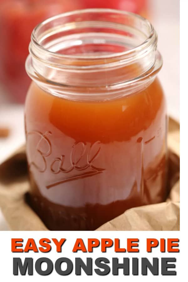 easy apple pie moonsshine recipe in a mason jar with text overlay that reads easy apple pie moonshine