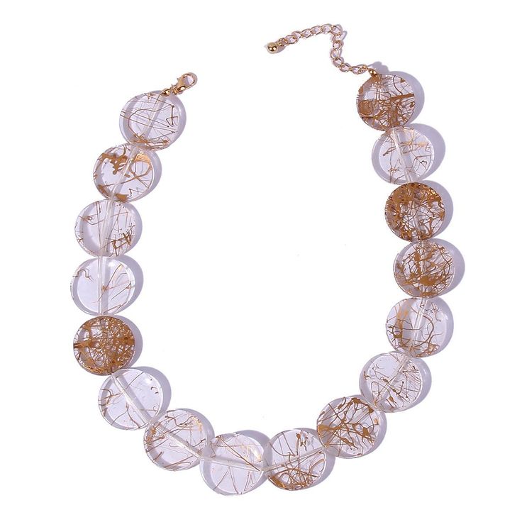 Look no further for a timeless classic to complete your collection. Our Retro Gold & Clear Necklace adds the perfect touch of elegance to any outfit. With its vintage inspired design, this sparkling piece beautifully complements both casual and formal wear. Made of acrylic material with a lavish gold finish and adorned with clear accents, this necklace brings a blend of the old and the new that's sure to turn heads. Elegant Glass Crystal Necklaces For Party, Clear Glass Necklaces For Party, Elegant Clear Crystal Beaded Necklaces, Elegant Crystal Beaded Necklaces With Clear Beads, Elegant Clear Necklace For Formal Occasions, Adjustable Clear Necklace For Party, Elegant Round Glass Crystal Necklaces, Clear Glass Necklaces For Wedding, Elegant Glass Beaded Necklaces For Parties