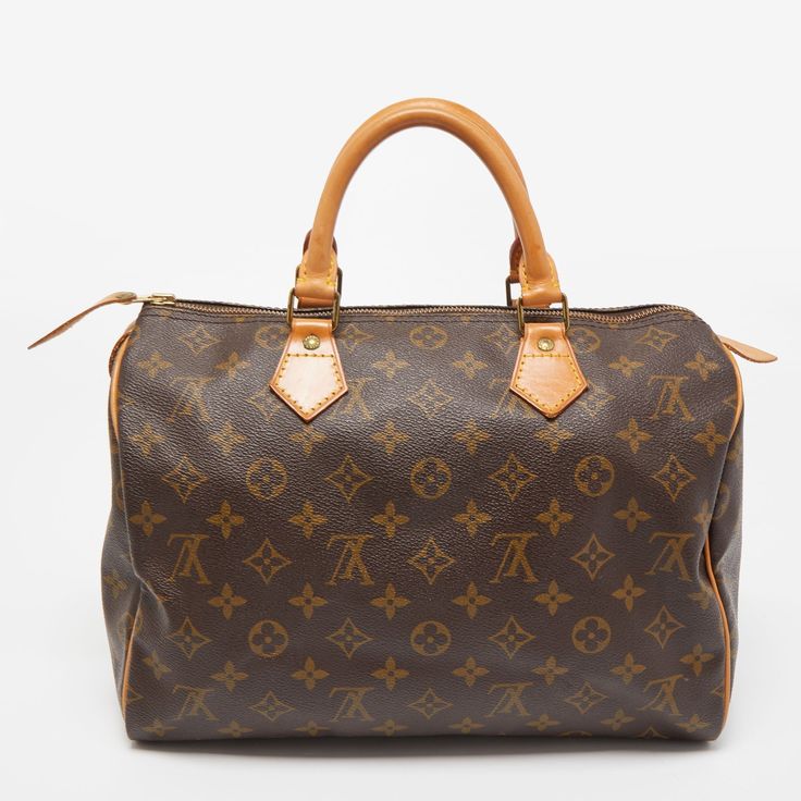 LOUIS VUITTON Monogram Canvas Speedy 30 BagA classic handbag comes with the promise of enduring appeal boosting your style time and again. This Speedy 30 bag is one such creation. It's a fine purchase. Size: Height: 22 cm Width: 18 cm Length: 30 cmMaterial: LeatherDelivery 5-8 or 10-15 working days Please note that during high season and Sale period, delivery times may be affected We accept payment with a Credit card, Debit card, or PayPal.Note: Our Items are totally New High quality Brand Inspi Elegant Monogram Canvas Rectangular Bag, Elegant Rectangular Monogram Canvas Bag, Elegant Monogram Canvas Bag For Daily Use, Elegant Monogram Canvas Bags For Daily Use, Classic Monogram Canvas Satchel With Gold-tone Hardware, Classic Monogram Canvas Bag For Shopping, Classic Monogram Canvas Shopping Bag, Timeless Formal Bag With Rolled Handles, Classic Monogram Canvas Bag With Handles